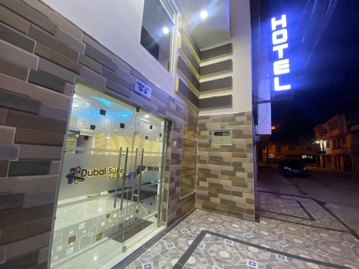 Hotel Dubai Suite Pasto Bagian luar foto